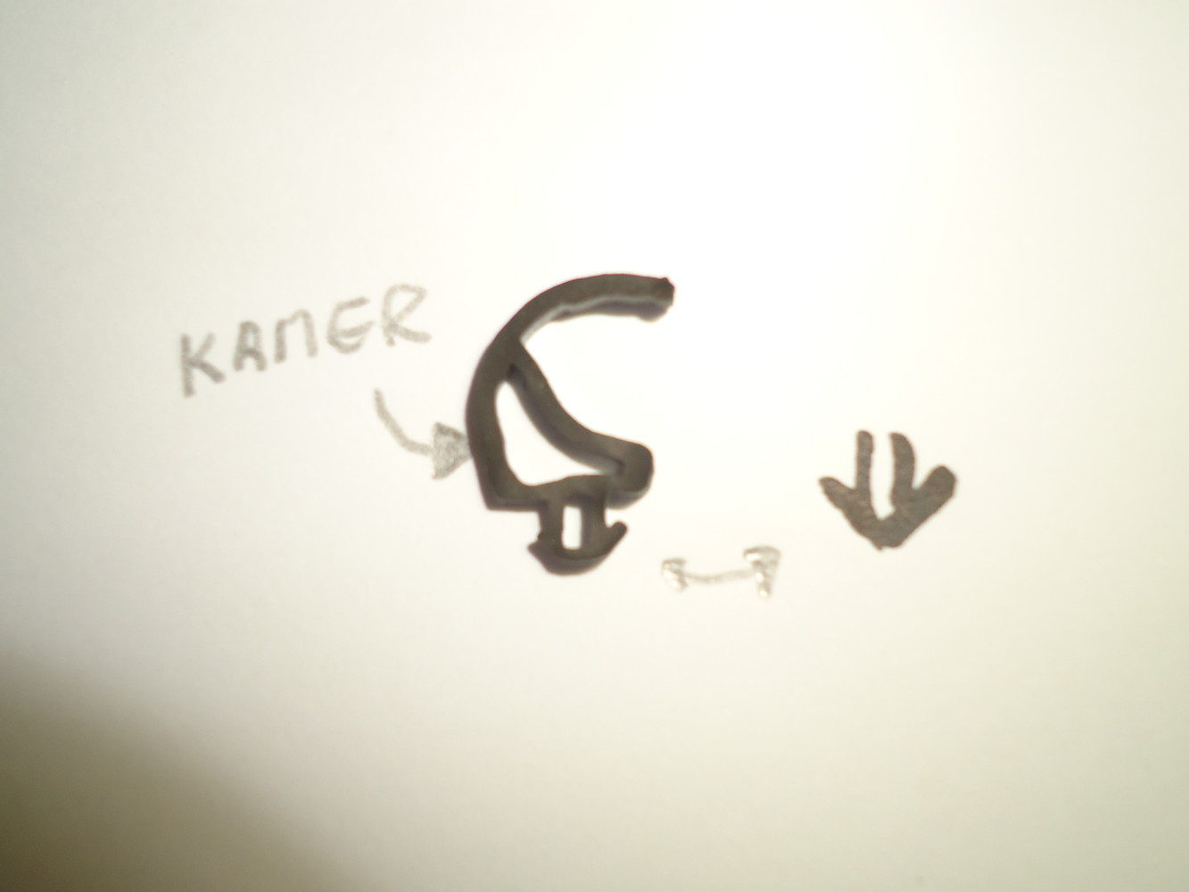 Kozijnrubber met indruk en kamer